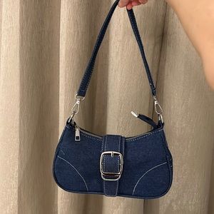 Buckle and chain denim baguette bag